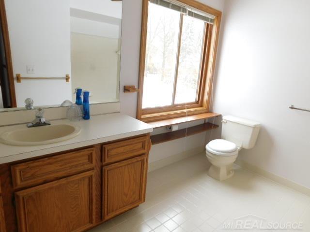 Builiding view nineteen for 48515 Hidden Oaks, Utica, MI. 48317