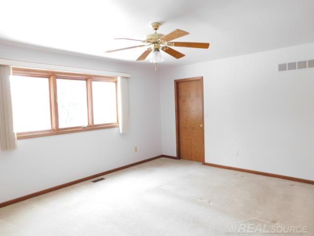 Builiding view seventeen for 48515 Hidden Oaks, Utica, MI. 48317