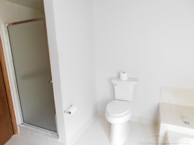 Builiding view sixteen for 48515 Hidden Oaks, Utica, MI. 48317