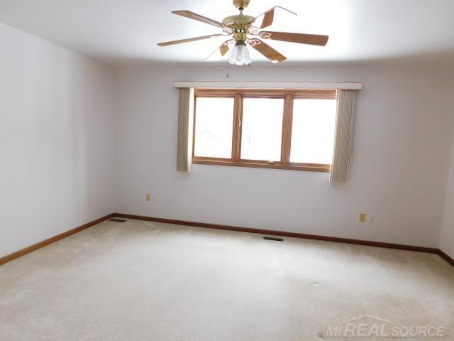 Builiding view thirteen for 48515 Hidden Oaks, Utica, MI. 48317