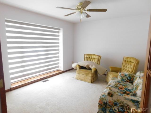 Builiding view twelve for 48515 Hidden Oaks, Utica, MI. 48317