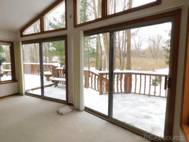 Builiding view twenty one for 48515 Hidden Oaks, Utica, MI. 48317