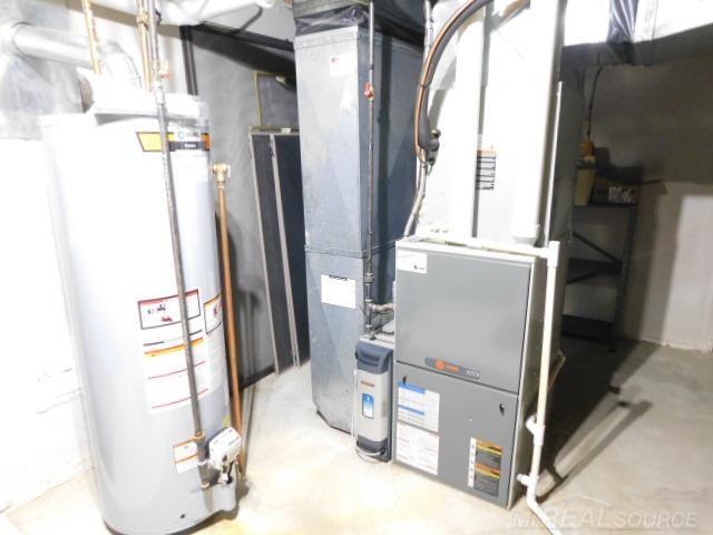 Builiding view twenty three for 48515 Hidden Oaks, Utica, MI. 48317