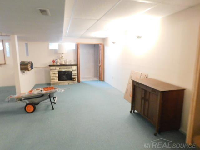 Builiding view twenty two for 48515 Hidden Oaks, Utica, MI. 48317