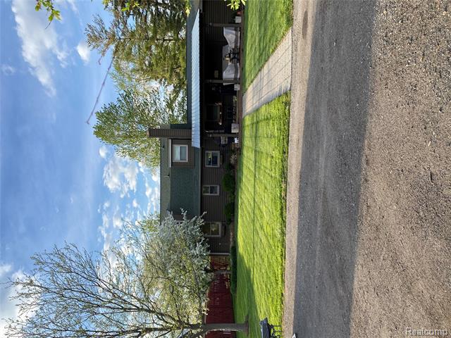 Builiding view three for 8402 27 Mile, Washington, MI. 48094