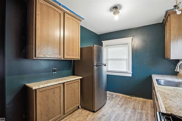 Builiding view twenty four for 180 S Main, Romeo, MI. 48065