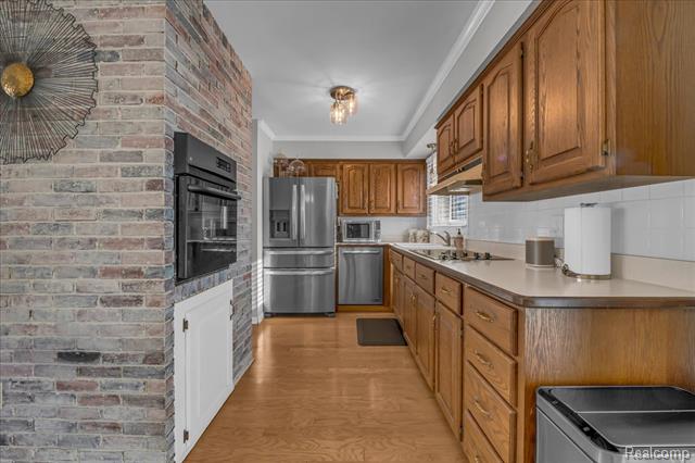 Builiding view ten for 33027 Meadowlark, Farmington, MI. 48336