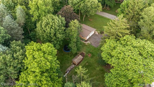 Builiding view fifty seven for 21201 E Chigwidden, Northville, MI. 48167