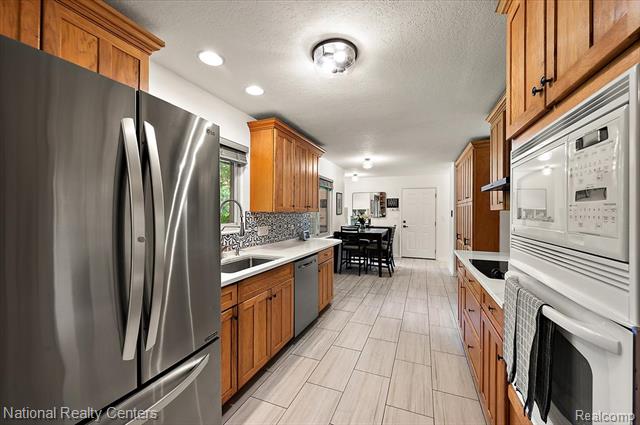 Builiding view fourteen for 21201 E Chigwidden, Northville, MI. 48167
