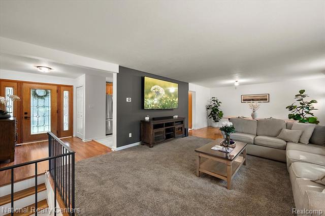 Builiding view ten for 21201 E Chigwidden, Northville, MI. 48167
