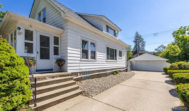 Builiding view three for 21202 Collingham, Farmington, MI. 48336