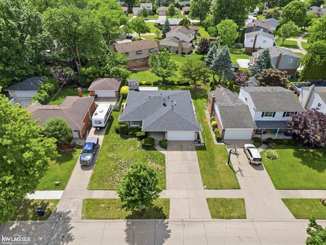 Builiding view three for 34265 Greentrees Roa, Sterling Heights, MI. 48312