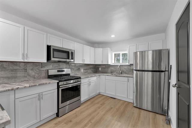Builiding view eleven for 21004 Reimanville, Ferndale, MI. 48220