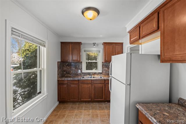 Builiding view ten for 21696 Purdue, Farmington, MI. 48336