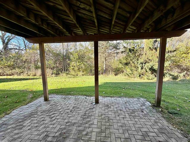 Builiding view fifty nine for 22200 River Ridge, Farmington, MI. 48335