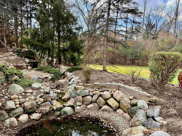 Builiding view four for 22200 River Ridge, Farmington, MI. 48335