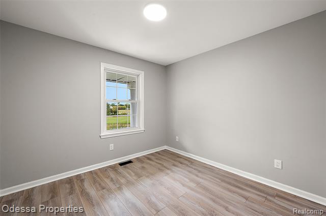 Builiding view forty for 1442 Riley Center, Memphis, MI. 48041