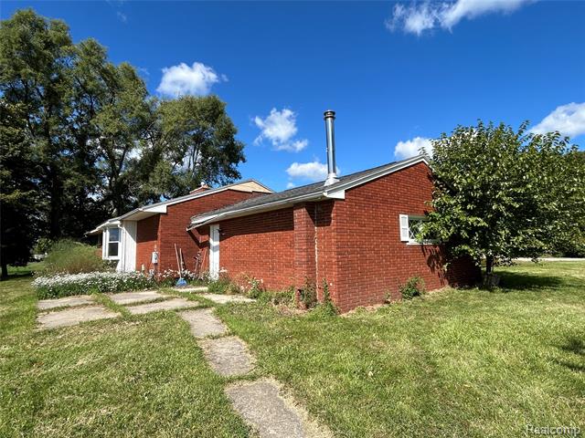 Builiding view four for 16465 Almont, Allenton, MI. 48002