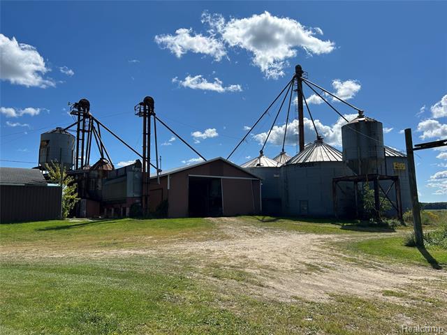 Builiding view nine for 16465 Almont, Allenton, MI. 48002