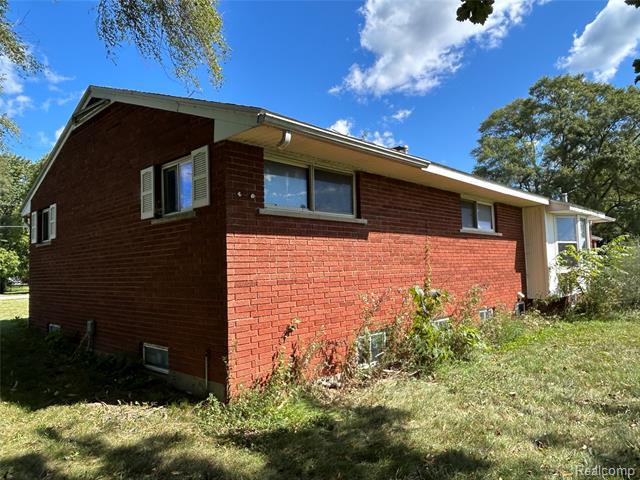 Builiding view six for 16465 Almont, Allenton, MI. 48002