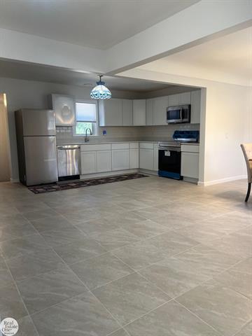 Builiding view seven for 6928 Lapeer, North Street, MI. 48049