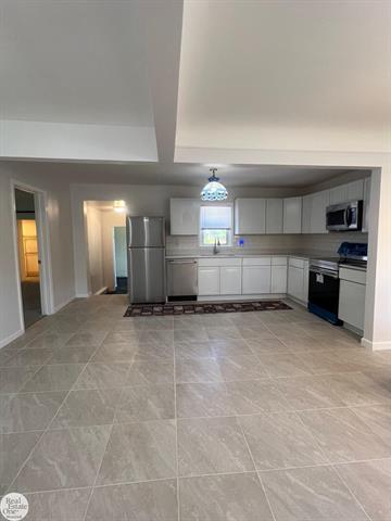 Builiding view ten for 6928 Lapeer, North Street, MI. 48049