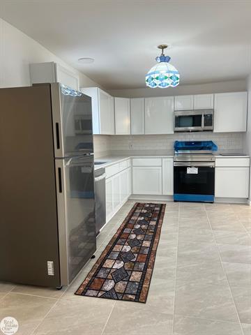 Builiding view thirty for 6928 Lapeer, North Street, MI. 48049