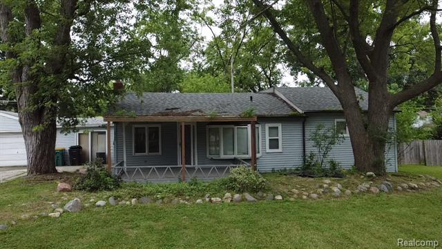 front view picture of 23106 Springbrook Dr, Farmington, MI. 48336