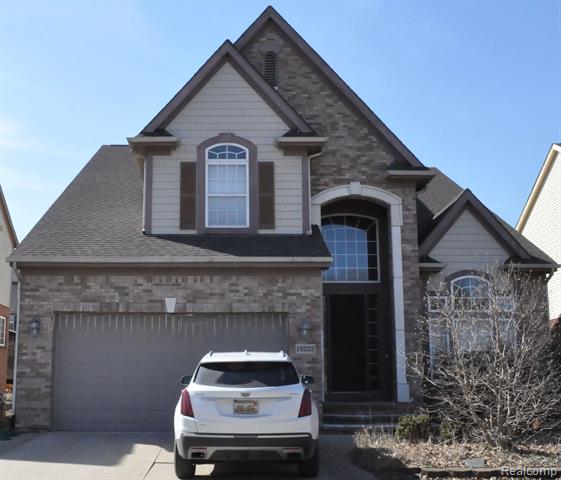 front view picture of 16323 Westminister Dr, Northville, MI. 48168