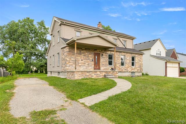 front view picture of 29950 6 Mile Rd, Livonia, MI. 48152