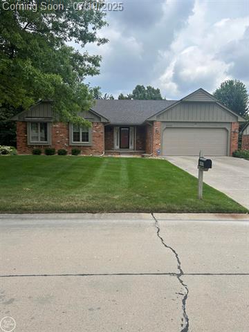 front view picture of 40920 Knightsford Rd, Northville, MI. 48168
