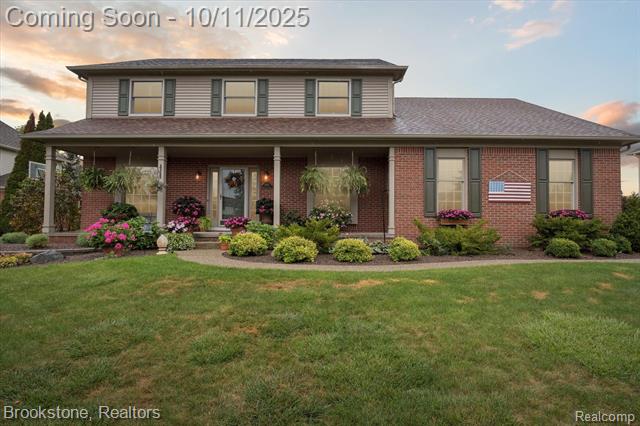 front view picture of 9079 Woodgrove Dr, Plymouth, MI. 48170