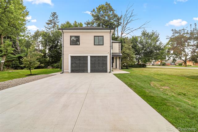 front view picture of 9409 S Main, Plymouth, MI. 48170