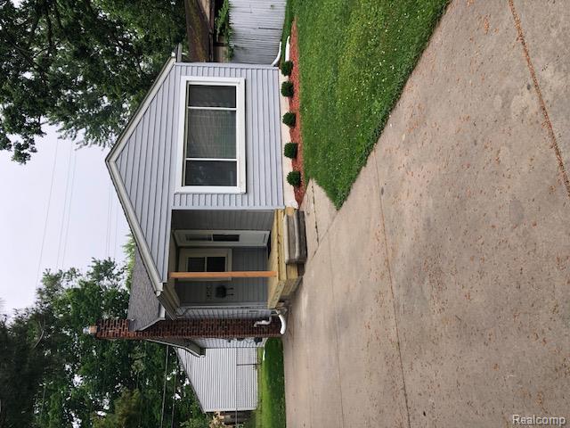 front view picture of 23424 Hoover Ave, Hazel Park, MI. 48030