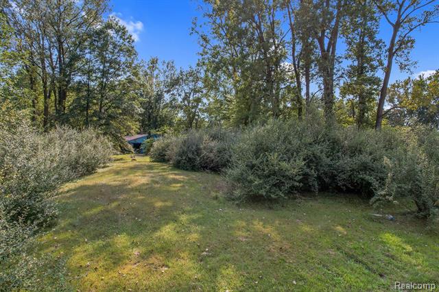 front view picture of 46921 Arkona Rd, Belleville, MI. 48111