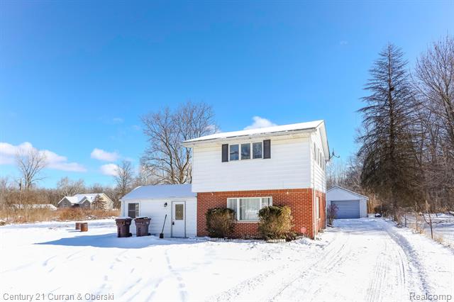 front view picture of 27439 Sumpter Rd, Belleville, MI. 48111