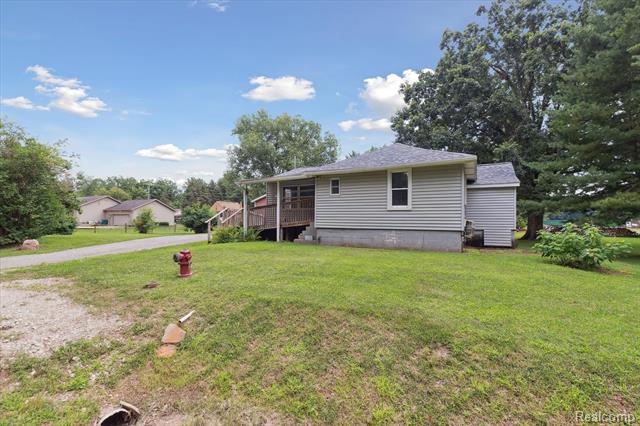 front view picture of 37801 Ash Rd, New Boston, MI. 48164