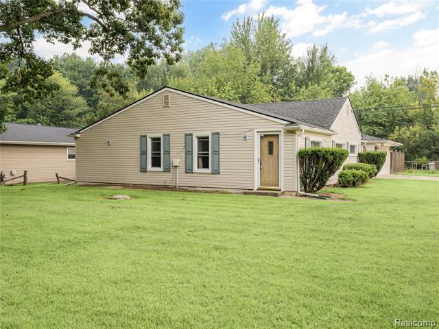 front view picture of 45175 Willis Rd, Belleville, MI. 48111