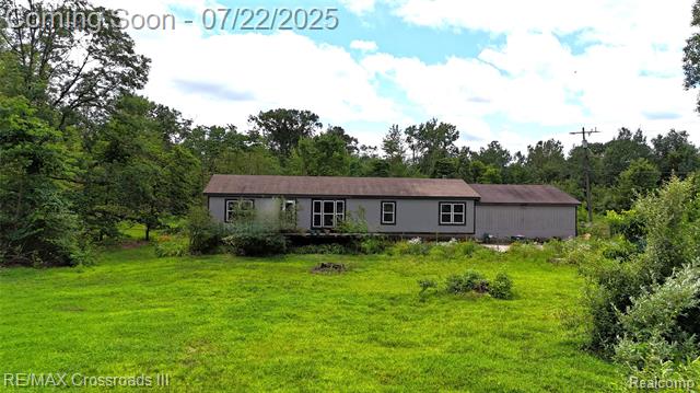 front view picture of 51105 Arkona Rd, Belleville, MI. 48111
