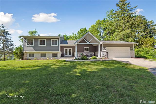 front view picture of 47400 W Huron River Dr, Belleville, MI. 48111