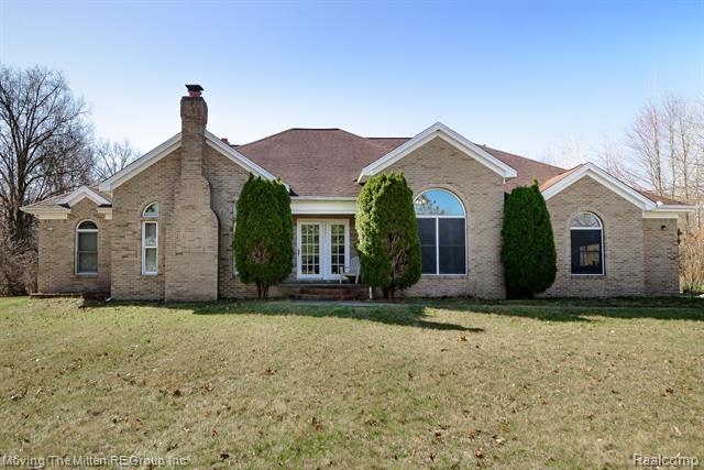 front view picture of 46901 Executive Dr, Belleville, MI. 48111