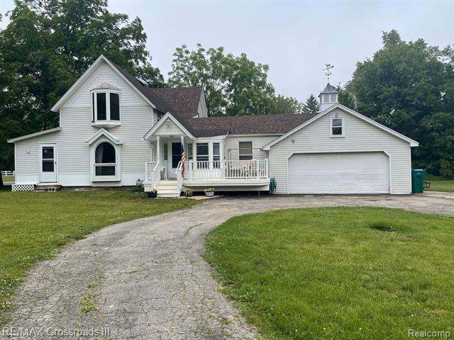 front view picture of 13300 Edgedale St, Belleville, MI. 48111