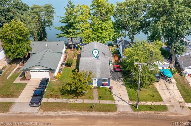 front view picture of 48460 Ormond Dr, Belleville, MI. 48111