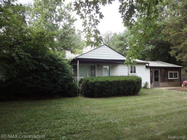 front view picture of 19670 Karr Rd, Belleville, MI. 48111