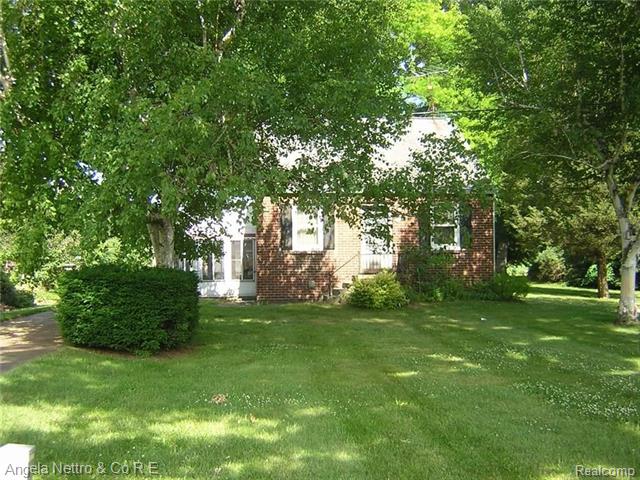 front view picture of 20375 Sumpter Rd, Belleville, MI. 48111