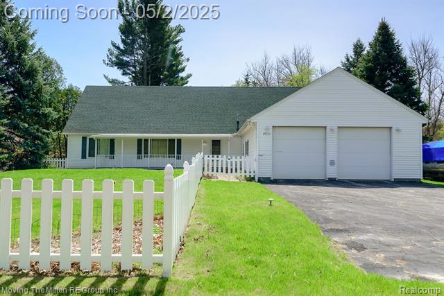 front view picture of 49335 Wear Rd, Belleville, MI. 48111