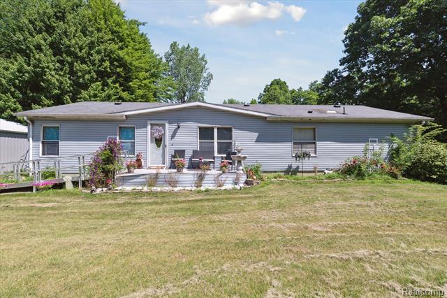 front view picture of 48620 Wear Rd, Belleville, MI. 48111