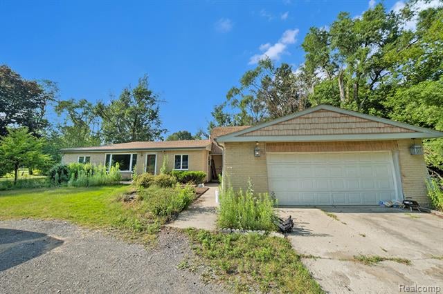 front view picture of 48150 Wear Rd, Belleville, MI. 48111
