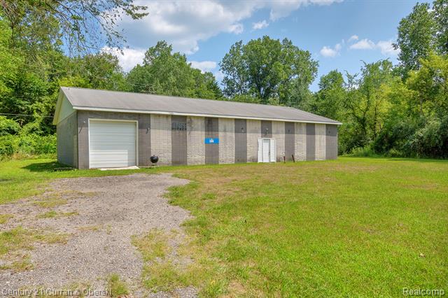 front view picture of 24473 Sumpter Rd, Belleville, MI. 48111