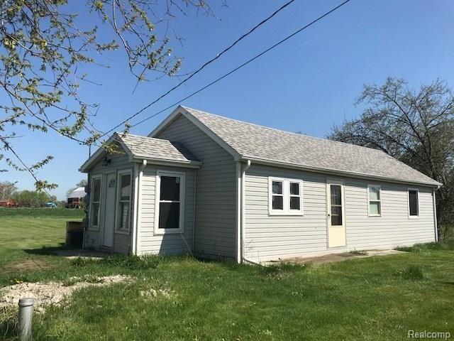 front view picture of 25401 Clark Rd, New Boston, MI. 48164